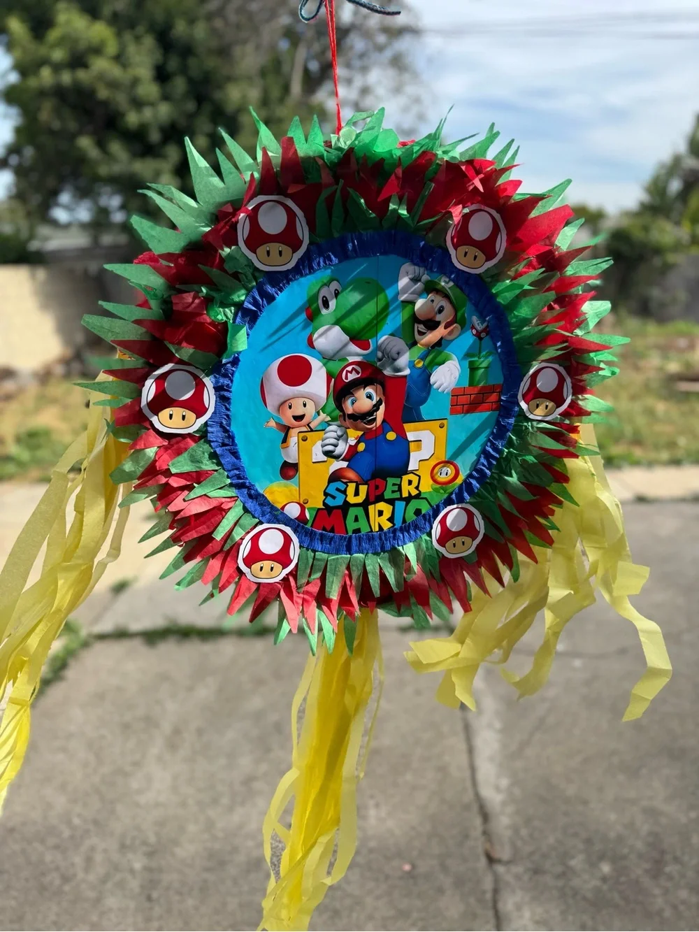 Super Mario Red & Green Party Piñata with Yellow Streamers